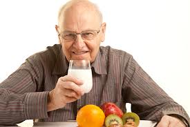 man swallowing liquids during swallow evaluation